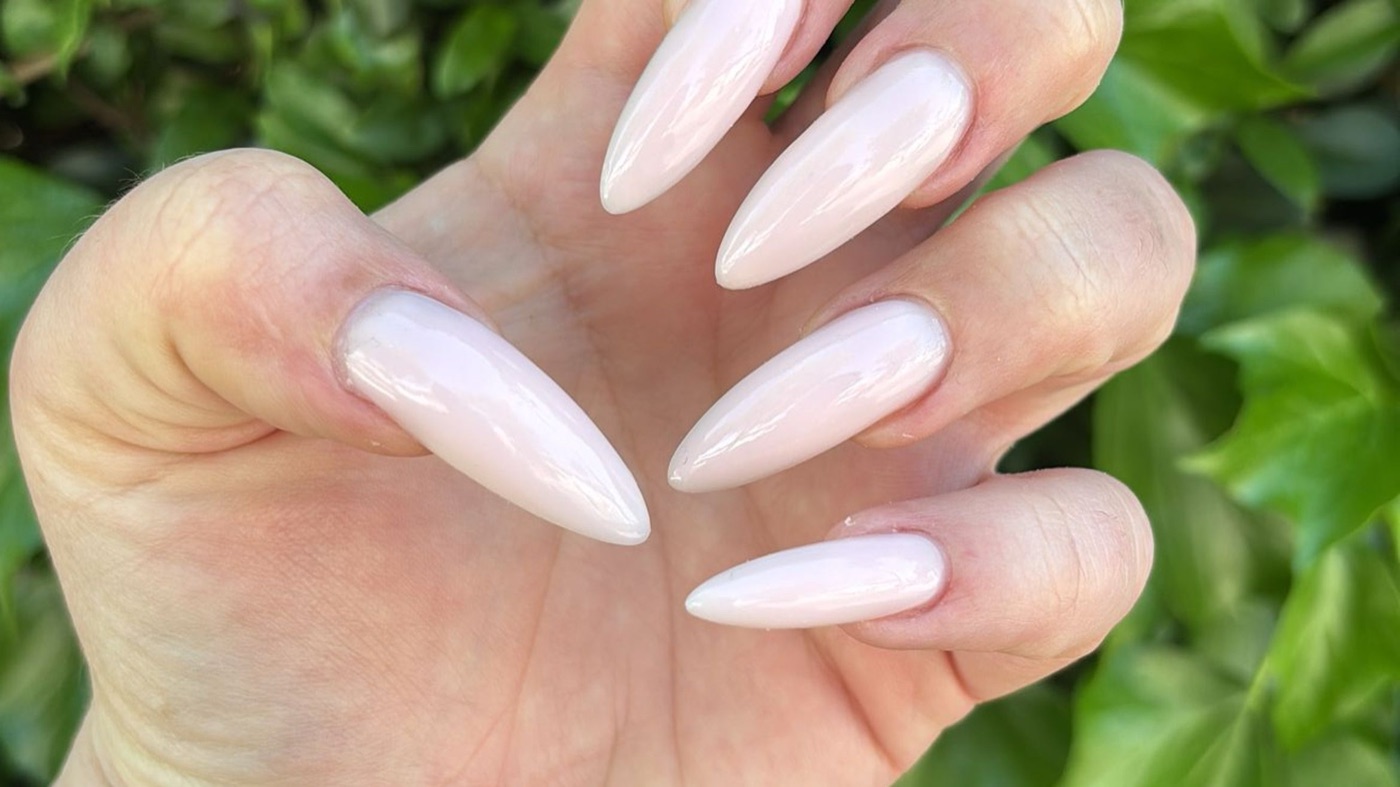 Long pale-pink almond nails